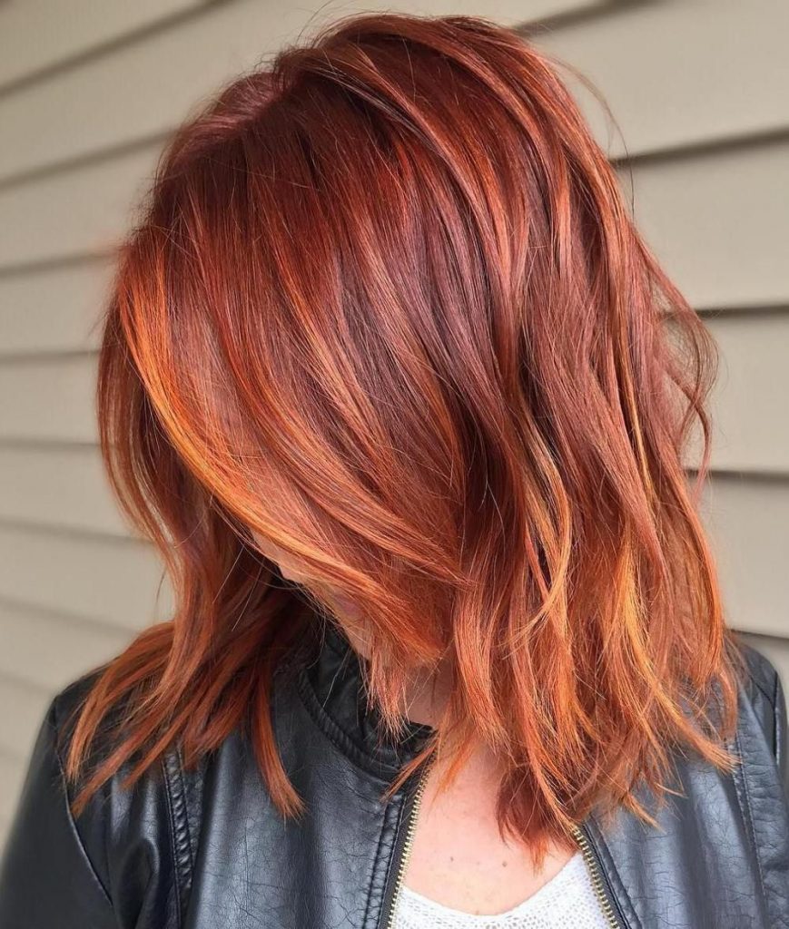 Руде волосся з переходом до світлого відтінку 